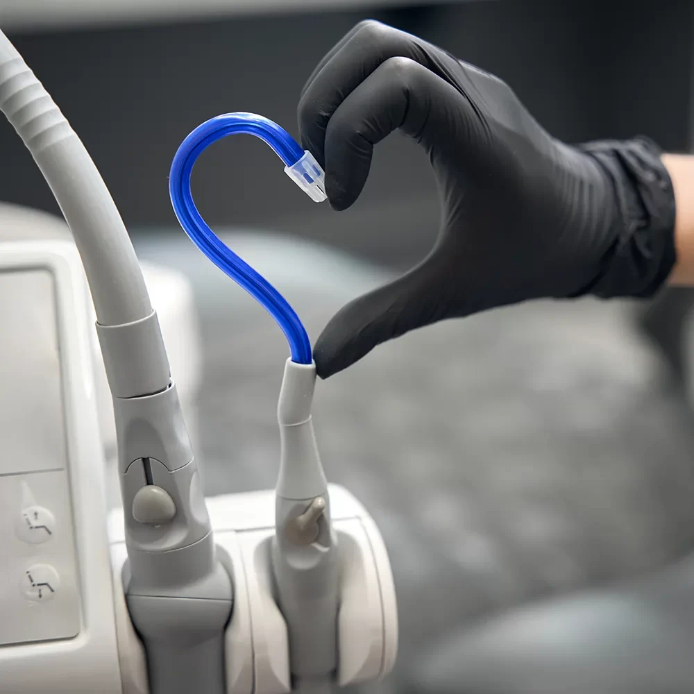 Oral surgeon using advanced tools of dentistry in Canada